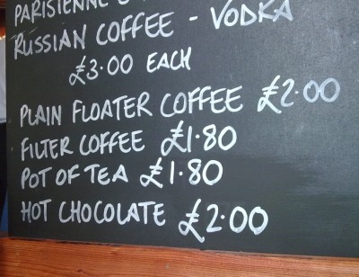 A sign offering floater coffee